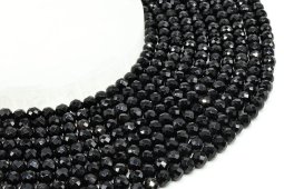Cuentas facetadas de ónix negro de 6 mm en un hilo de 40 cm.